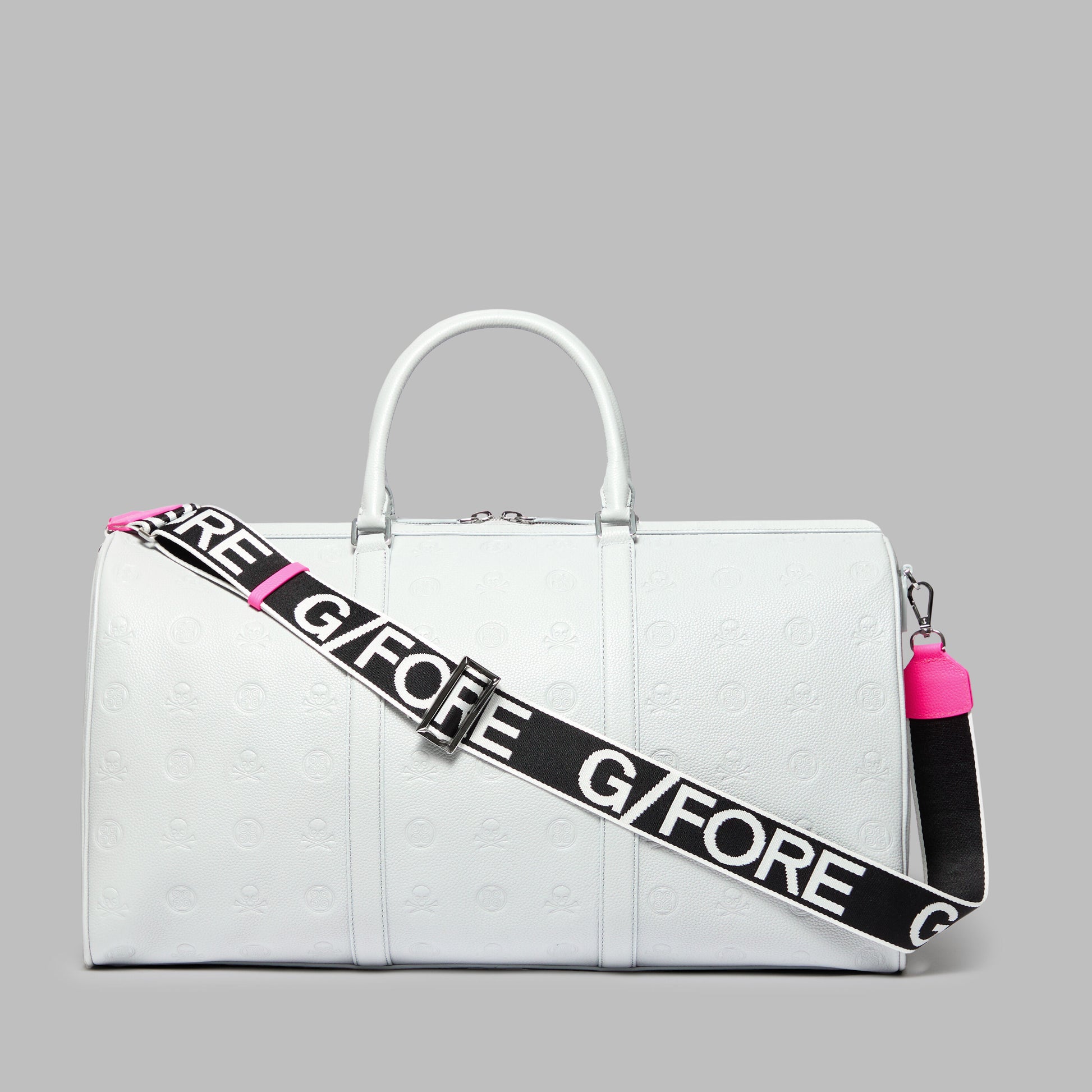 G/FORE EMBOSSED SKULL & TEES LEATHER WEEKENDER