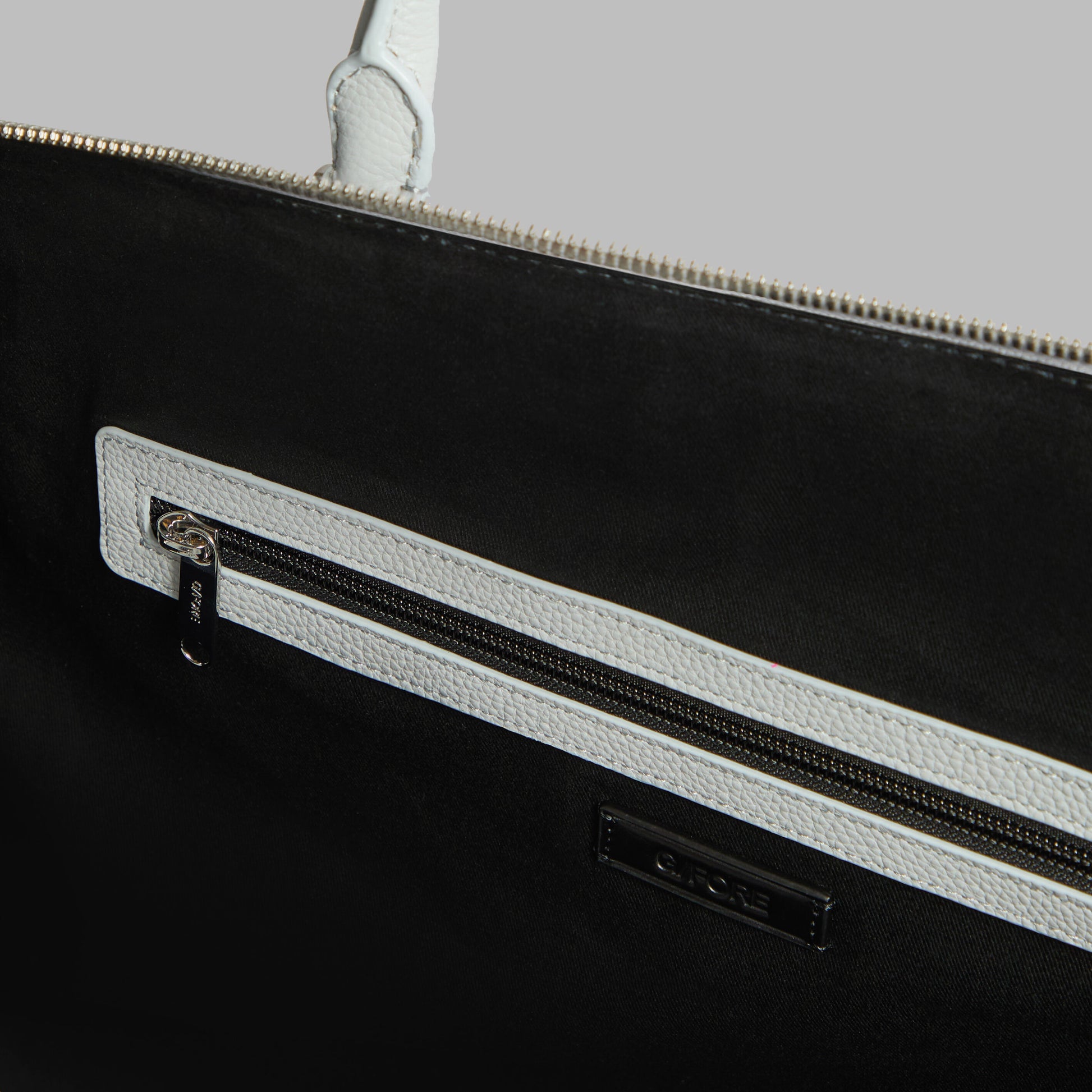 G/FORE EMBOSSED SKULL & TEES LEATHER WEEKENDER