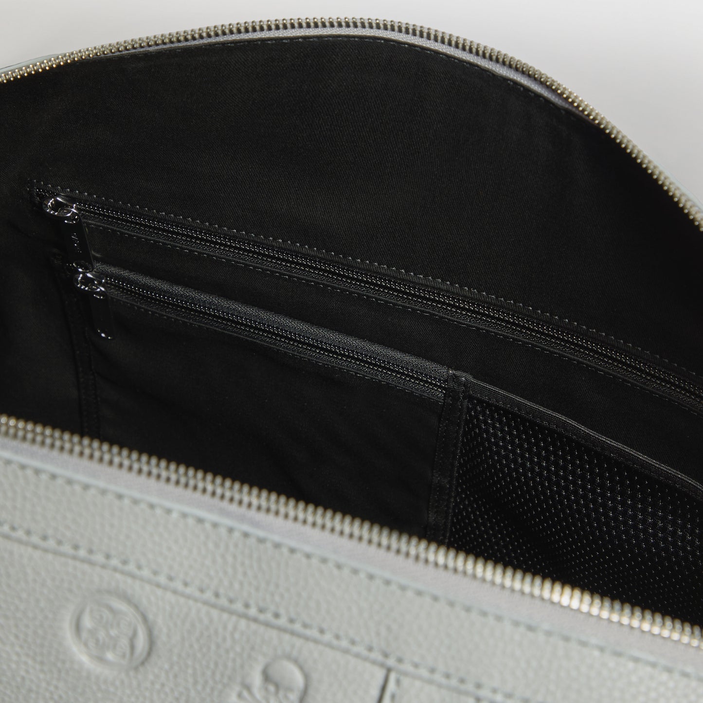 G/FORE EMBOSSED SKULL & TEES LEATHER WEEKENDER